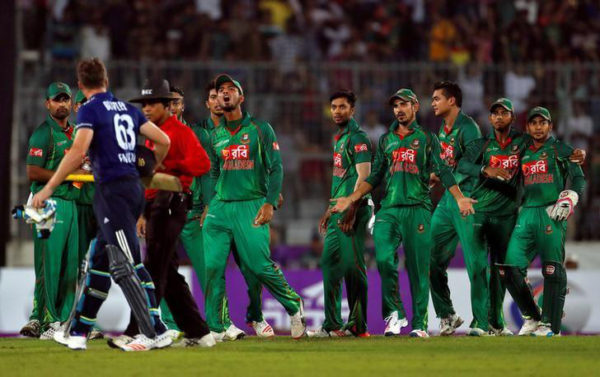 England’s Jos Buttler exchanges words with the Bangladesh players following his dismissal yesterday. (Reuters photo)