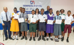 Demerara Mutual presented eight bursary awards to policyholders’ children who were successful at the 2016 National Grade Six Assessment at its 19th Annual Bursary Award function which was held on October 17, 2016.
Chairman of the Board of Directors, Richard B Fields made the presentation of bursaries valued at $11,000 each, according to a press release from Demerara Mutual.
The Most Outstanding Student this year was Mark Bentick who was awarded a place at Bishops’ High School and the Runner Up Student was  Azarya Willis  who was awarded a place at St Stanislaus College.
The other bursary recipients were Princess Patterson, Kayla Mc Allister,            Daniel Seaford, Tiffiann Henry, Grace Browne and Shan Norton.
These awardees will receive $11,000 per year for the next five years until they complete their secondary education.