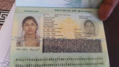 The information page in the fake passport that was being used by Anjanie Boodnarine, who went by the name Christine Persaud. (Royston Drakes photo)