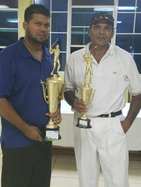 Father and Son! First and fourth place winners, Richard and Fazil Haniff pose with their trophies