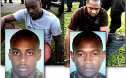 Ex-Special Forces officers Devon Edwards, left, and Steve Douglas, who were held by the Highway Patrol with illegal guns in Charlieville, Chaguanas, yesterday. 