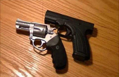 The .38 revolver and 9mm pistol that were found on the man. 