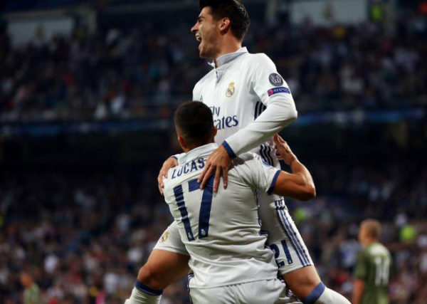 Real Madrid’s Lucas Vazquez celebrates with teammate Alvaro Morata after scoring a goal.  (REUTERS/Javier Barbancho)