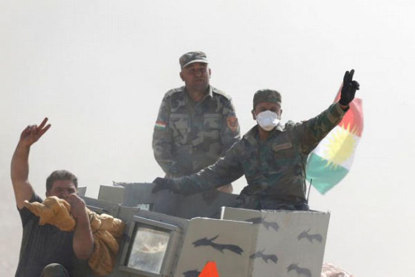 Peshmerga forces advance in the east of Mosul to attack Islamic State militants in Mosul, Iraq. REUTERS/Thaier Al-Sudani 