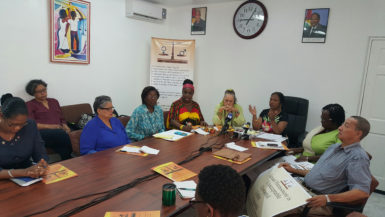 Chairperson of the WGEC, Indra Chandarpal (third from right) and other members, from right: the lone male who represents the cultural aspect, Peter Persaud, Debra Henry, a professional; Vanda Radzik, Nicole Cole,  Sandra Hooper and Halima Khan of the ROC