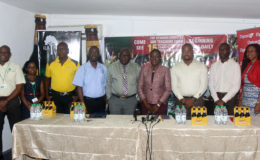 Minister, Nicolette Henry (fourth from right)  with the sponsors and organizers following the launch of the 56th edition of the National Schools Cycling, Swimming and Track and Field Championships yesterday at the auditorium of the National Centre for Educational Resource Development. (Orlando Charles photo)

