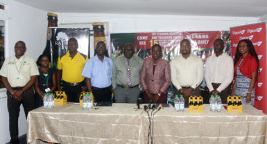 Minister, Nicolette Henry (fourth from right)  with the sponsors and organizers following the launch of the 56th edition of the National Schools Cycling, Swimming and Track and Field Championships yesterday at the auditorium of the National Centre for Educational Resource Development. (Orlando Charles photo) 