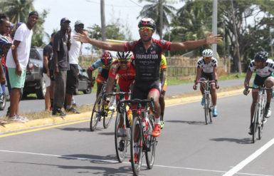 Geron Williams reacts after taking the initial stage yesterday morning ahead of Alanzo Greaves and Shaquel Agard. (Orlando Charles photo) 