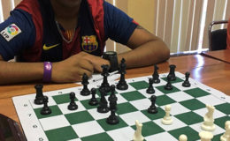 New National junior chess champion Saeed Ali contemplates a move during the recent Closed championships.