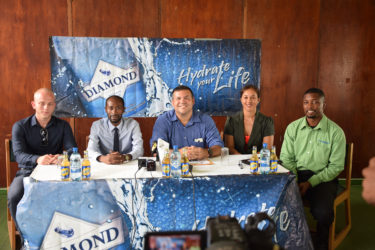 The 12th Diamond Mineral Water Hockey Festival Launch party, from left to right, Carib Beer representative Robert Hiscock, Diamond Mineral Water Brand Manager Larry Wills, GHB President Philip Fernandes, GHB Secretary Tricia Fiedtkou and GHB executive Devin Hooper.