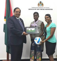 Prime Minister Moses Nagamootoo, with teachers from Corentyne Comprehensive High School,  Shauna Sinclair-Paul and Bisoondai Lokhai. (Office of the Prime Minister photo) 