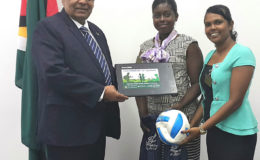 Prime Minister Moses Nagamootoo, with teachers from Corentyne Comprehensive High School,  Shauna Sinclair-Paul and Bisoondai Lokhai. (Office of the Prime Minister photo)