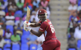 Darren Sammy, above, is eager to play with the Universe Boss, Chris Gayle.
