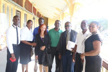 Guyana Teachers’ Union executive members with their lawyer outside the court after the decision was read. From left are Regional Vice President for Demerara Collis Nicholson, Sumanta Alleyne, Julian Cambridge, Stacy Benjamin, Lancelot Baptiste, attorney Roysdale Forde, GTU President Mark Lyte and General Secretary Coretta McDonald. 