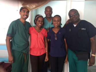 A few of the doctors from the Caribbean Medical Mission, along with a local doctor.  From left: Dr Kevin Clarke, Dr Latoya Gooding, Dr Trevor Dixon, Dr Matoya Cort and Dr Trevor Layne.