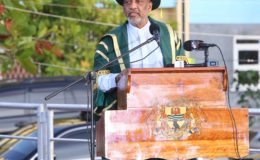 Dr. Vincent Adams, Deputy Field Manager at the United States’ Department of Energy, delivers the commencement speech to the graduates at the University of Guyana’s 50th Convocation Ceremony. Adams urged the graduates to stay in Guyana and use all possible opportunities to make the country great. (Photo by Keno George)
