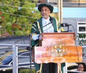 Dr. Vincent Adams, Deputy Field Manager at the United States’ Department of Energy, delivers the commencement speech to the graduates at the University of Guyana’s 50th Convocation Ceremony. Adams urged the graduates to stay in Guyana and use all possible opportunities to make the country great. (Photo by Keno George)  