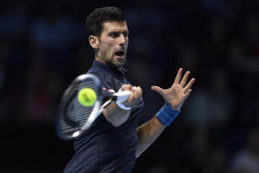 Serbia’s Novak Djokovic in action during his round robin match with Canada’s Milos Raonic (Photo: Reuters/ Tony O’Brien)