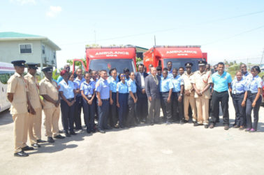 Minister of Public Security, Khemraj Ramjattan and Minister of Public Health, Dr. George Norton (centre) along with members of the Guyana Fire Service, and Emergency Medical Technicians (GINA photo)