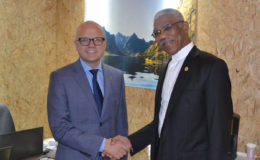 President David Granger (right) and Minister of Climate and Environment,  Vidar Helgesen of the Kingdom of Norway following their meeting on Wednesday. (Ministry of the Presidency photo)