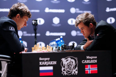 Serjey Karjakin and Magnus Carlsen in deep concentration during yesterday’s game six encounter. (Photo courtesy Fide website)