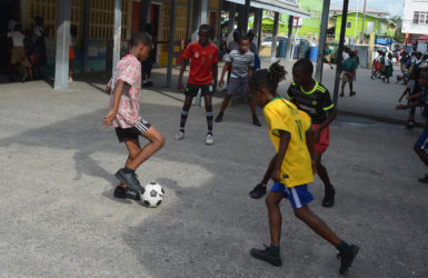 Captain of St. Angela’s Antonio McArthur (left) initiating an attacking pattern alongside Seon Cato (right) during the final practice session before their clash with neighbors St. Agnes in the Courts Pee Wee Football finals.