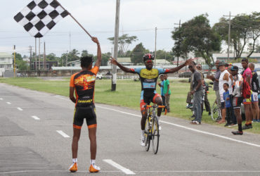 Soloist! Shaquel Agard completed back-to-back wins yesterday after a breakaway from the remnants of the peloton at the bell lap. (Orlando Charles photo) 