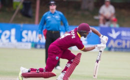Batsman Shai Hope push drives during his maiden ODI hundred against Zimbabwe on Saturday. (Photo courtesy WICB Media) 