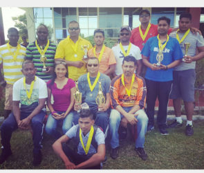 The winners with Digicel champ Joaan Deo: Standing from left, Ravi Jagdat (CIDI), Roland Fanfair (Digicel), Paul Parasram (Digicel), Rohan Mangal (Digicel), Trevor Parasram (CIDI), BideshPersaud (Digicel), Pradeep Baidjoe (CIDI), and Leon Sewnandan (CIDI). Sitting from left: Rajesh Singh (Auto), Joaan Deo, Ravin Balkaran(Auto), and Saeed Mohammed (Auto).