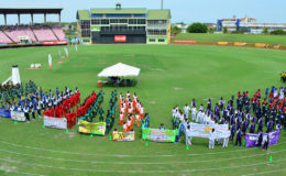 The teams at yesterday’s opening ceremony at the National Stadium, Providence.