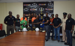 Representatives from participating teams at the launch of the 7th edition of the Guinness Greatest in the Streets football tournament yesterday, along with Lee Baptiste, Guinness brand manager (extreme left), Carena Damon of Colours Boutique (5th from left), Mark Carrega , Up Like 7 team member, shaking hands with Ian Charles , Guinness Rep.(centre), Troy Mendonca, Petra (3rd from right), and Troy Peters, Banks DIH Communications Officer,(extreme right).
