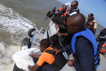 The police disposing of the cocaine into the Atlantic Ocean