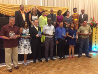 Front row from left: Captain Gerald Gouveia of Roraima Group of Companies, Rehana Rahim of Palm Springs Hotel, Shawn McGrath of Cara Lodge, Gary Jordon of Obama Boat Service, Dicky Alvin of Rewa Eco Lodge, Iwokrama representative Shera Seelall and Leroy Ignacio of South Rupununi Conservation Society. Back row: Country Representative of the Inter-American Development Bank Sophie Makonnen (second, left), Minister of Business Dominic Gaskin (fourth, left) and Minister of Public Telecommunications Catherine Hughes (third, right) along with tourism and private sector executives. 