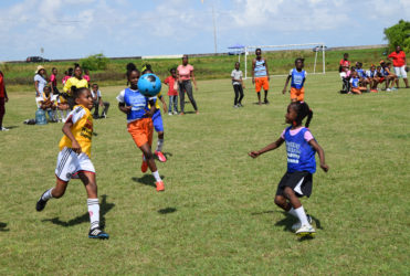 Part of the action in the 1-1 draw between St. Angela’s (yellow) and F.E. Pollard (blue) in the 3rd Annual Smalta Girls Pee Wee Football Championship at the Ministry of Education ground on Carifesta Avenue