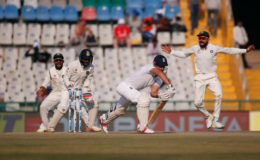 England’s captain Alastair Cook (2-R) is bowled by Ravichandran Ashwin (REUTERS/Adnan Abidi)