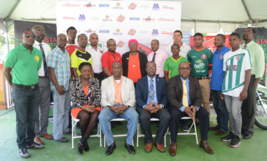 United Force-Members of the GFF Stag Beer Elite League launch party-Sitting from left to right- 3rd Vice-President Thandi McAllister, 1st Vice President Brigadier General Bruce Lovell (rtd.), GFF President Wayne Forde and 2nd Vice President Rawlston Adams- Standing are representatives of the sponsors and competing teams.