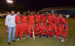 All Smiles! The new Banks DIH Limited Inter-Department tapeball cricket champions Soft Drink Plants posing for the camera after defeating Brewery in the final to claim their fifth Championship. 