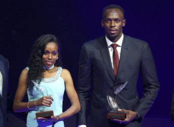 Usain Bolt of Jamaica (R) and Almaz Ayana of Ethiopia pose with their awards after being elected male and female World Athlete of the Year 2016 in Monaco, December 2, 2016. (REUTERS/Eric Gaillard) 