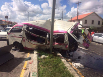The minibus which was slammed into a utility pole