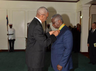 President David Granger conferring Prime Minister of Barbados Freundel Stuart with the Order of Roraima earlier this year