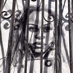 “Woman behind bars”, from a series of anti-catcalling, pro-respect posters. Photo by flickr user Wendy, CC BY-NC 2.0. 