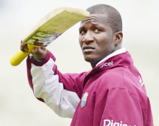 West Indies' captain Darren Sammy points with his bat during a training session before the third cricket test match against England at Edgbaston cricket ground in Birmingham June 6, 2012. REUTERS/Philip Brown (BRITAIN - Tags: SPORT CRICKET)