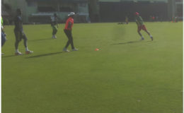 Members of the Guyana Jaguars team going through their paces with the pink ball yesterday at Providence.