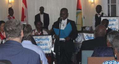 A young musician performing for the Christmas concert