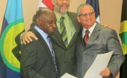Following the signing of the agreement: From left are Minister of Foreign Affairs, Carl Greenidge, CARICOM Secretary-General,  Irwin LaRocque and Ambassador of Cuba, Julio César González Marchante
Ambassador of Cuba Julio César González Marchante (right) making brief remarks prior to the signing of the agreement in the presence of Minister of Foreign Affairs, Carl Greenidge (left) and CARICOM Secretary-General, Ambassador Irwin LaRocque
(centre)