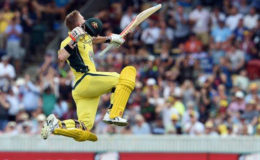 David Warner goes airborne after notching up his seventh One Day International ton. (BBC photo)