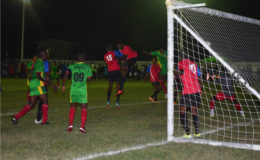 The Equalizer-Aubrey Greene (3rd from right) directing his powerful header into the back of the net during his side’s come from behind 3-1 win over Monedderlust FC in the GFF Stag Beer Elite League at the No. #5 ground in Berbice.