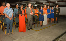 From left to right: Ben ter Welle, Honorary Consul of Germany to Guyana;  Manager of the Sexual Offences and Domestic Violence Policy Unit at the Ministry of Social Protection,  Akeelo Doris; British High Commissioner Greg Quinn, First Lady, Sandra Granger,  Ruta Drizyte-Videtic, the wife of the European Union Ambassador to Guyana and other attendees acknowledging a moment of silence for lives lost due to gender-based violence.   (Ministry of the Presidency photo)
