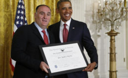 US President Barack Obama (right) honours Spanish-born chef and restauranteur José Andrés with the Outstanding American by Choice award during a naturalization ceremony at the White House in Washington July 4, 2014. (Reuters/Jonathan Ernst/File Photo) 