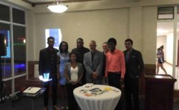 From left: Judason Bess of The Farmacy; Abbigale Loncke, founder of Community Healthcare; Shaunda Yarde, owner of Golden Crunch Coconut Biscuits; Dason Anthony, CEO of 592 Dresses, Minister of Business Dominic Gaskin, Amanda Cauldwell, Public Affairs Officer at the US Embassy; Triston Thompson, co-founder of Intellect Storm and Rosh Khan, owner of SocialRank.